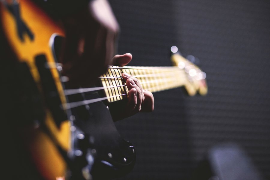 Bass guitarist playing on stage